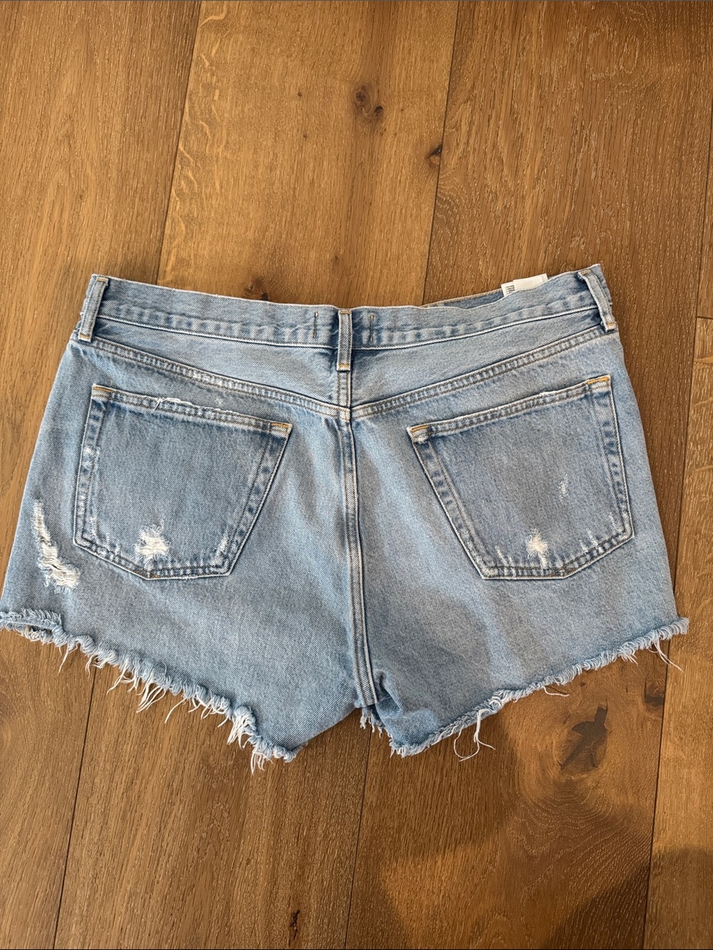 Agolde Light Wash Distressed Denim Cutoff Shorts - Picture 5 of 6